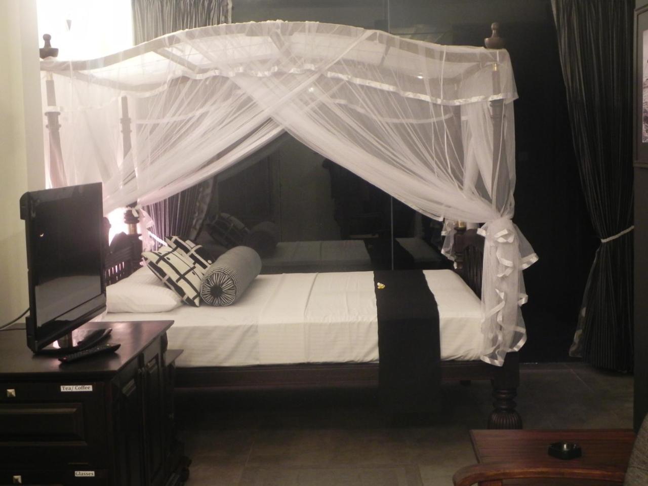 Amanda Beach Villas أونا واتونا الغرفة الصورة