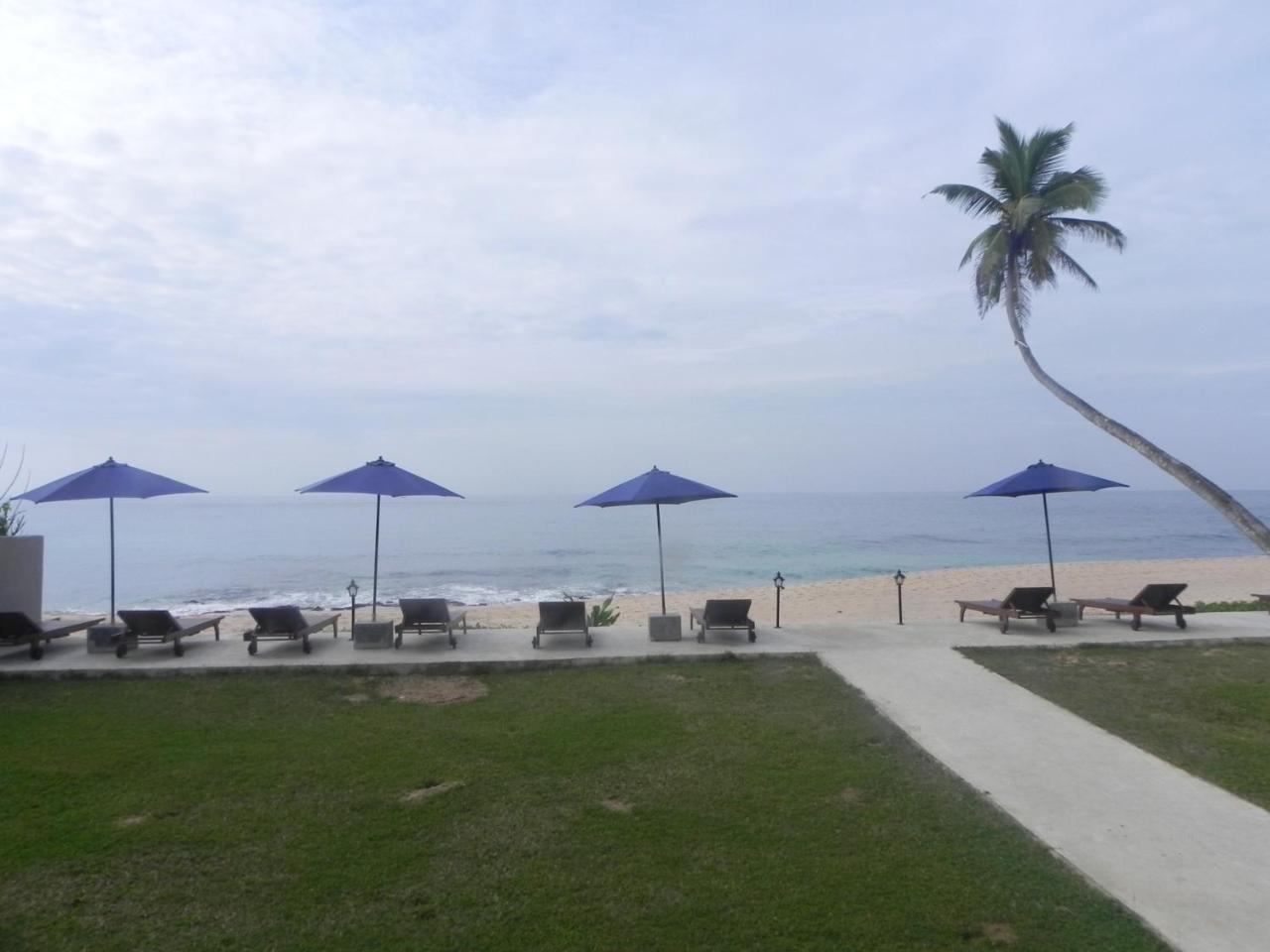 Amanda Beach Villas أونا واتونا الغرفة الصورة